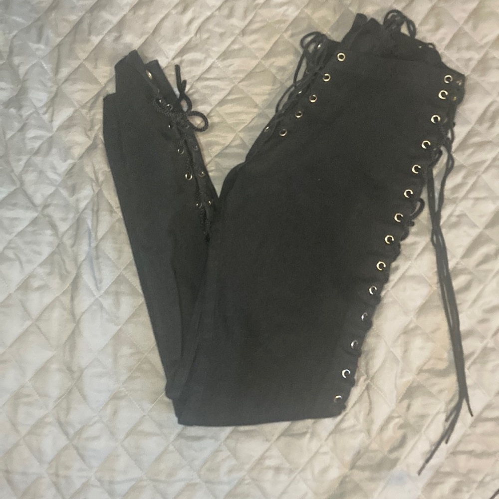 Women’s sexy lace up skinny jeans size 9 runs small